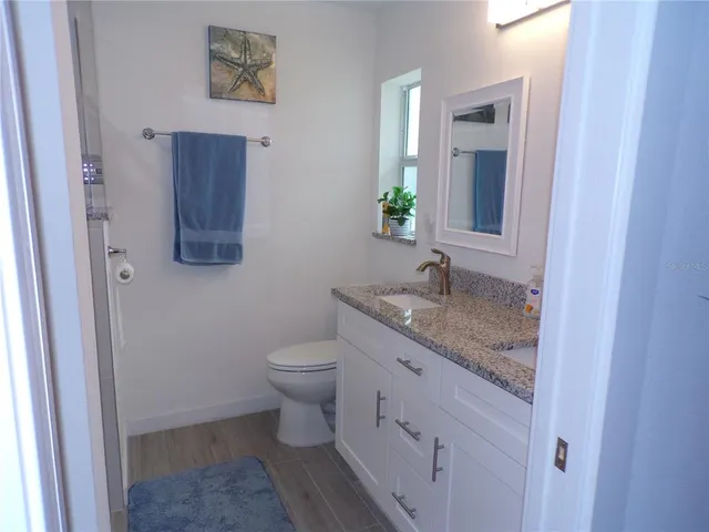 a view of a room with racks on the wall