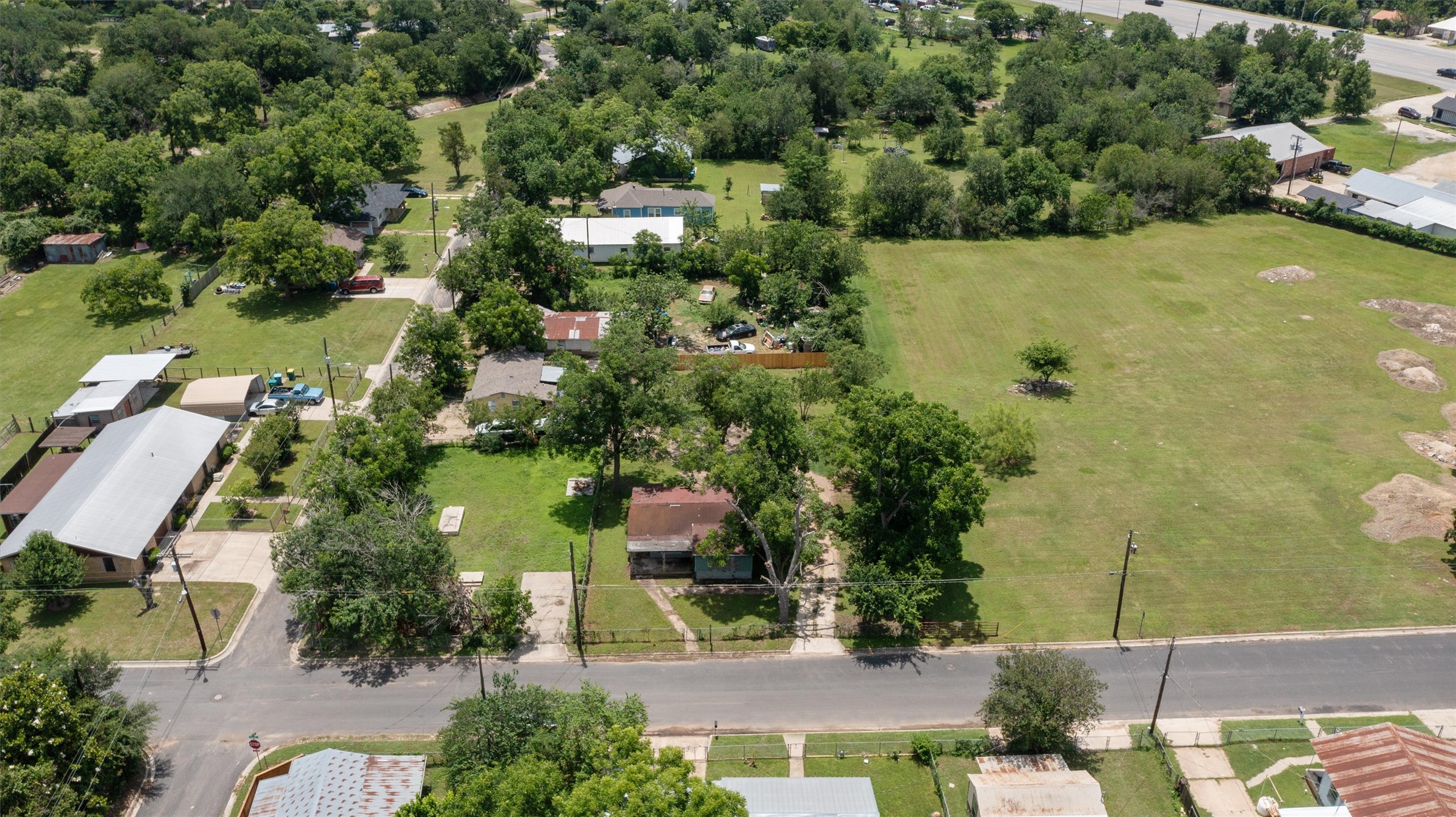 503 West Alamo Street Elgin, TX 78621 - Photo 3 of 11 an aerial view of residential house with outdoor space