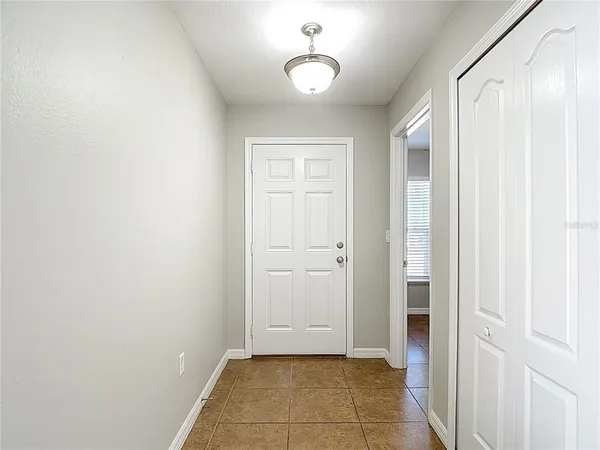 a view of an empty room with window