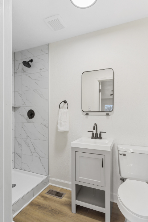 2803 Maplewood Drive Champaign, IL 61821 - Photo 25 of 39 a bathroom with a sink toilet and shower