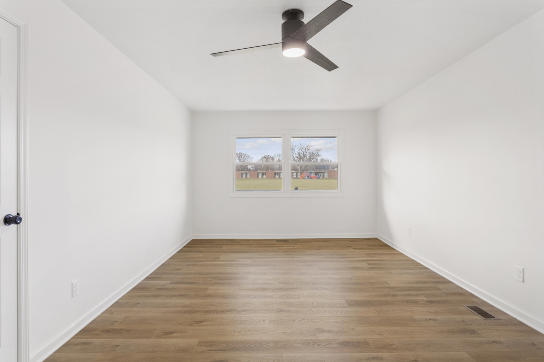 2803 Maplewood Drive Champaign, IL 61821 - Photo 27 of 39 wooden floor in an empty room