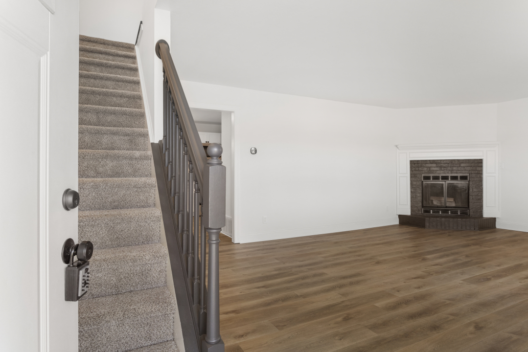2803 Maplewood Drive Champaign, IL 61821 - Photo 31 of 39 a view of an empty room with a fireplace