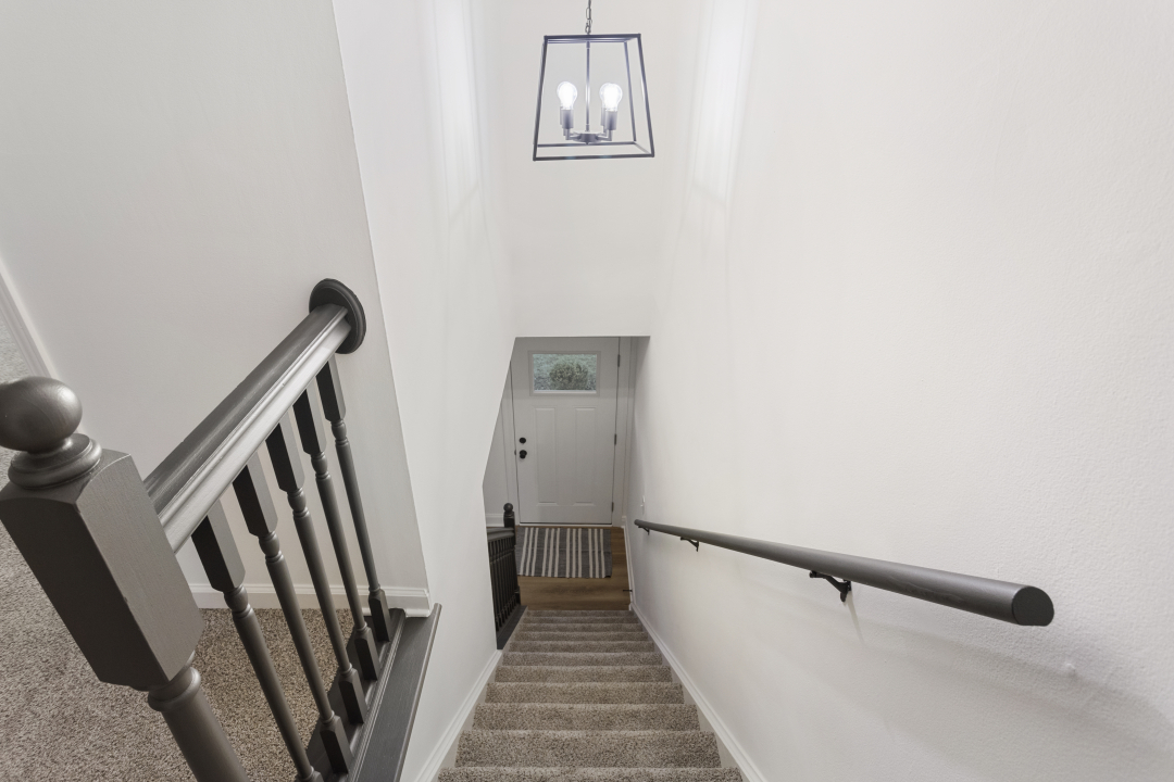 2803 Maplewood Drive Champaign, IL 61821 - Photo 32 of 39 a view of a hallway with staircase