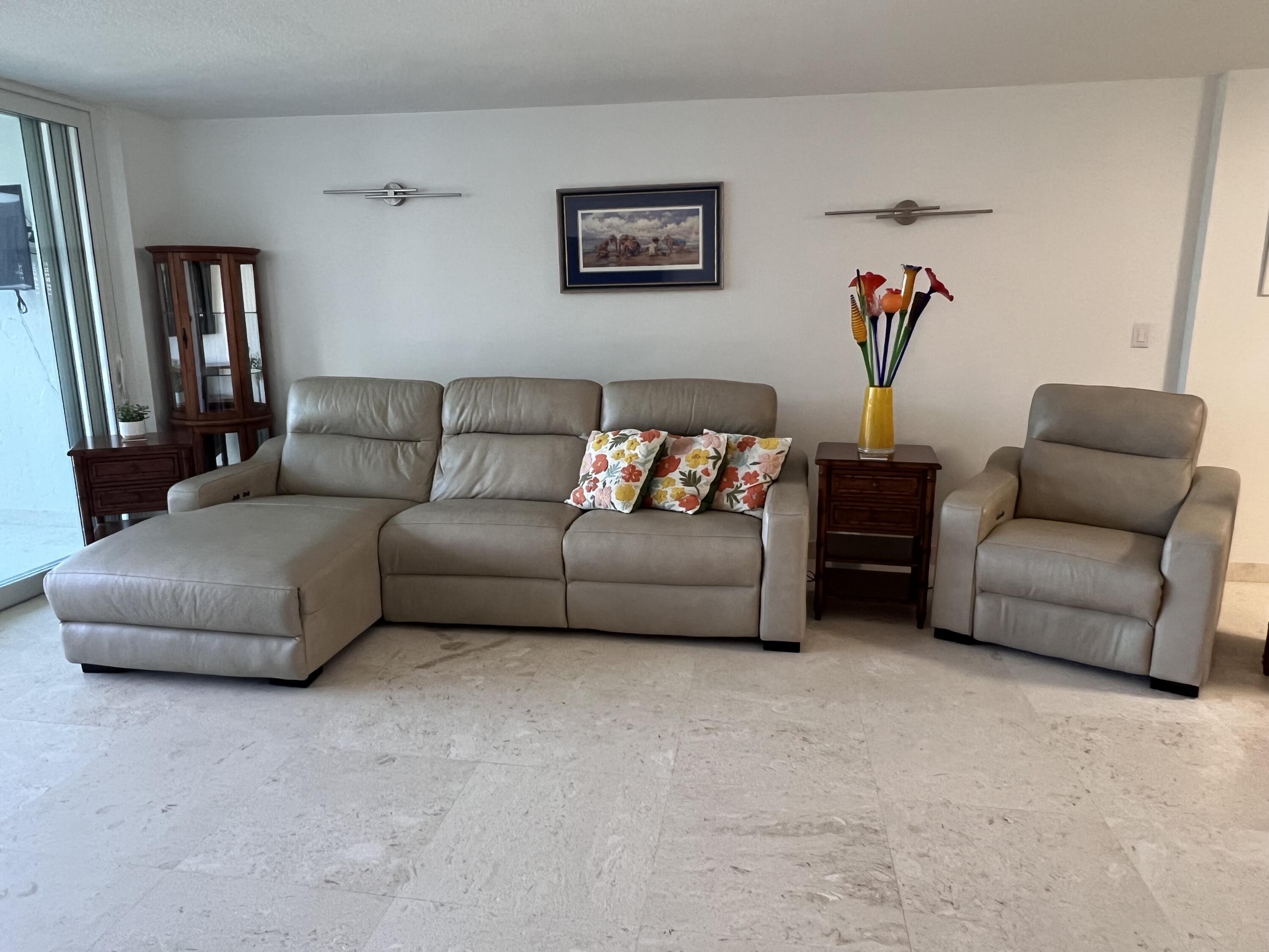 1629 Riverview Road, Unit 716 Deerfield Beach, FL 33441 - Photo 15 of 44 a living room with furniture and a couch