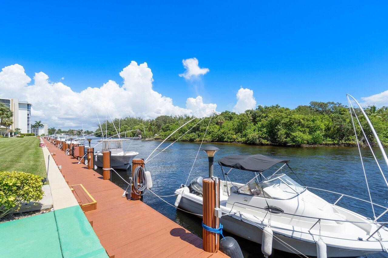1629 Riverview Road, Unit 716 Deerfield Beach, FL 33441 - Photo 28 of 44 a view of a lake with couches