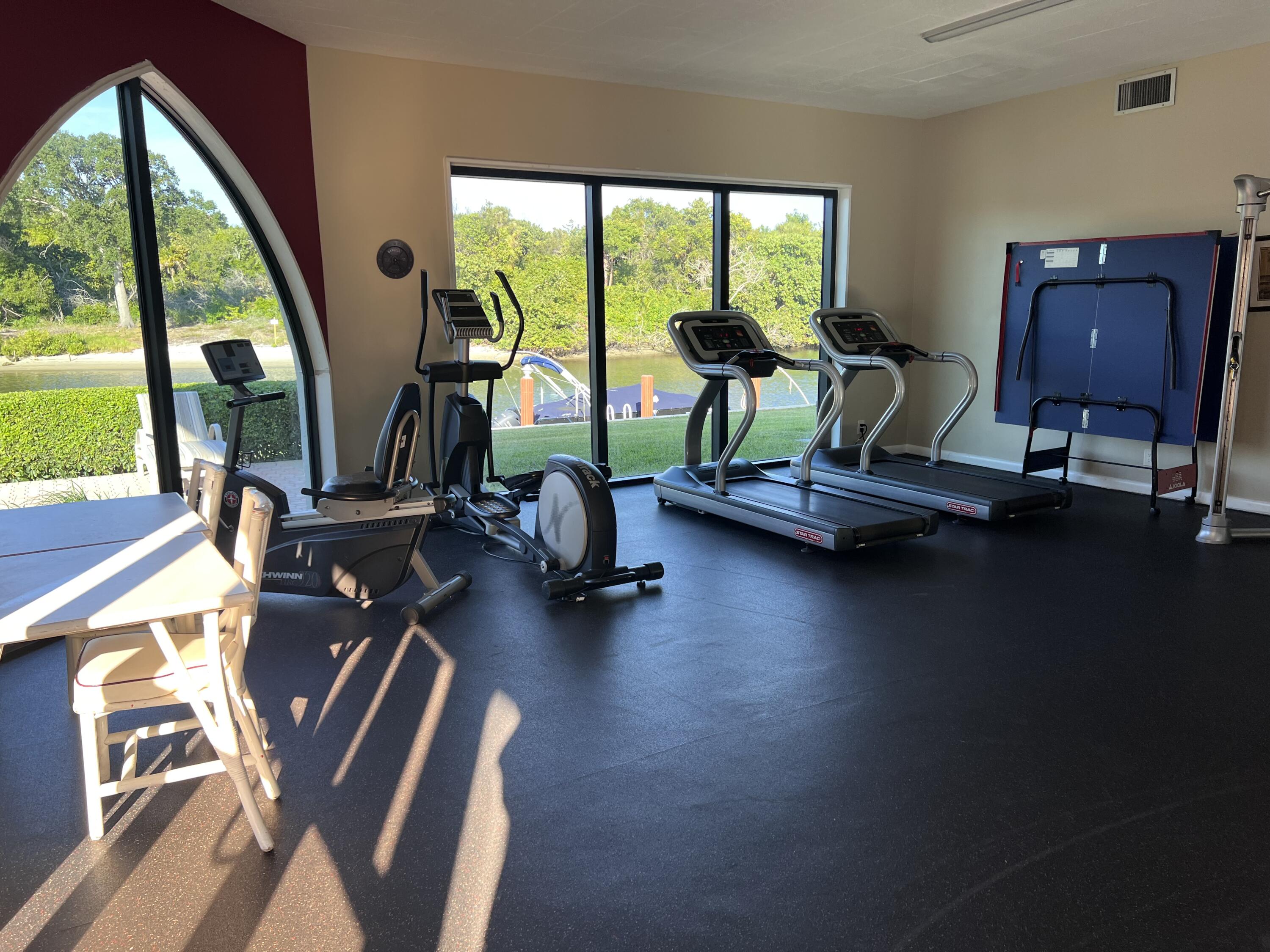 1629 Riverview Road, Unit 716 Deerfield Beach, FL 33441 - Photo 36 of 44 a view of a room with gym equipment
