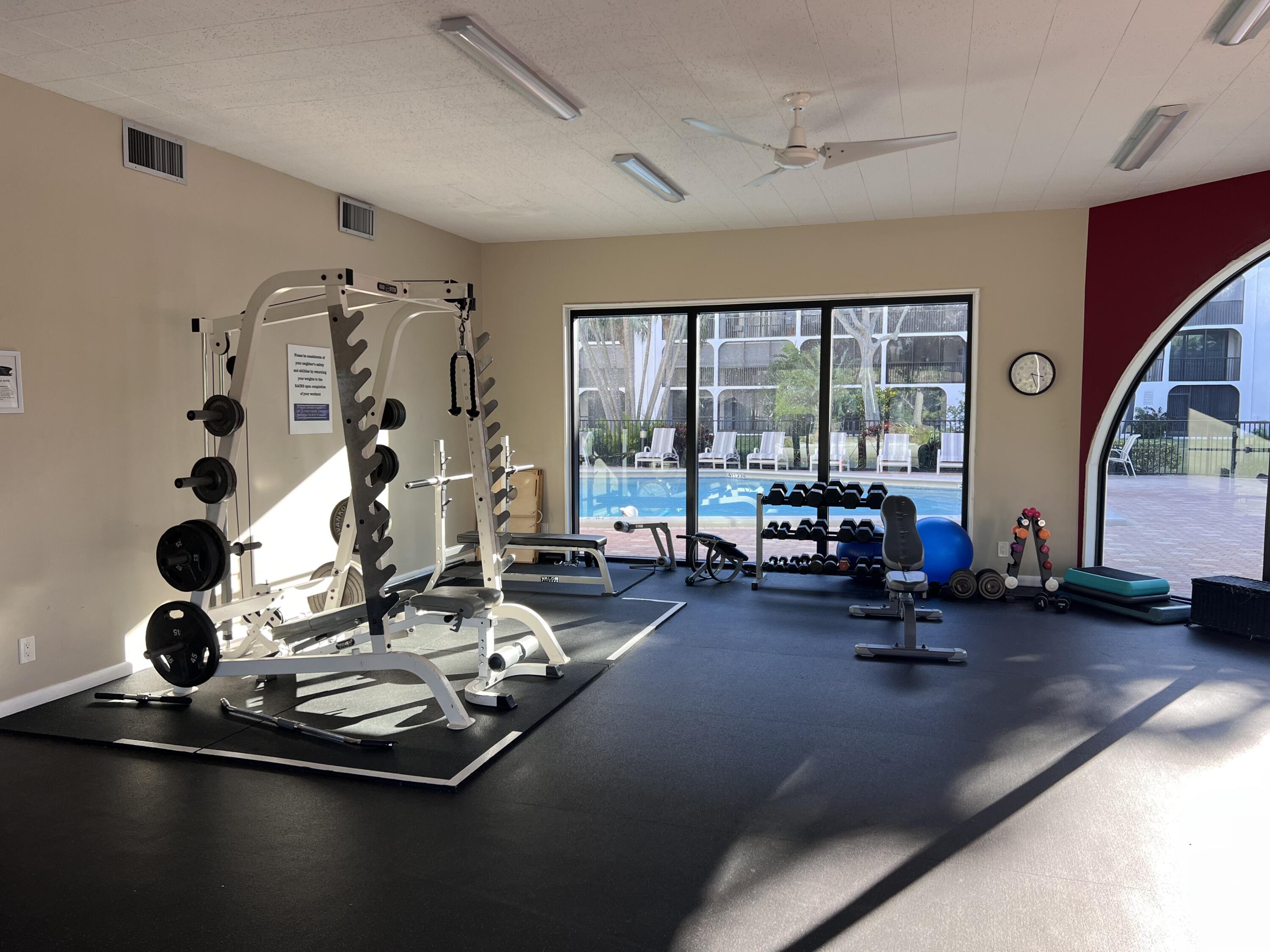 1629 Riverview Road, Unit 716 Deerfield Beach, FL 33441 - Photo 37 of 44 a living room with furniture and a large window