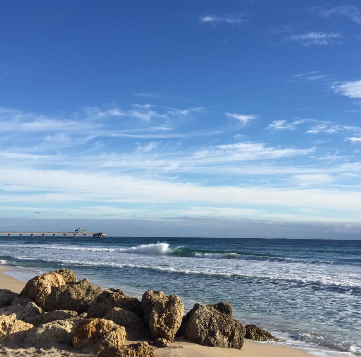 1629 Riverview Road, Unit 716 Deerfield Beach, FL 33441 - Photo 43 of 44 a view of an ocean and beach