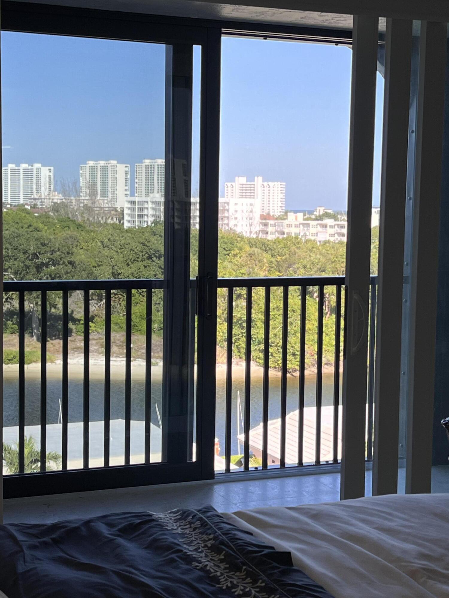 1629 Riverview Road, Unit 716 Deerfield Beach, FL 33441 - Photo 9 of 44 a view of wooden balcony