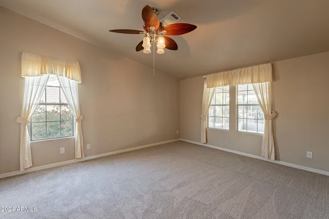 a view of an empty room and window