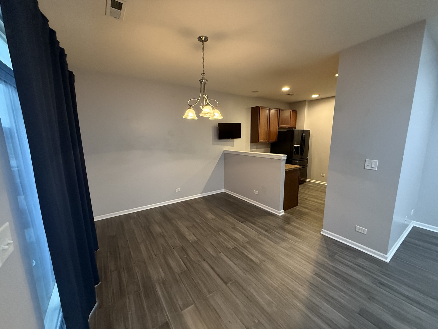 433 Acushnet Street, Unit 433 Elgin, IL 60124 - Photo 11 of 37 a view of a kitchen from the hallway