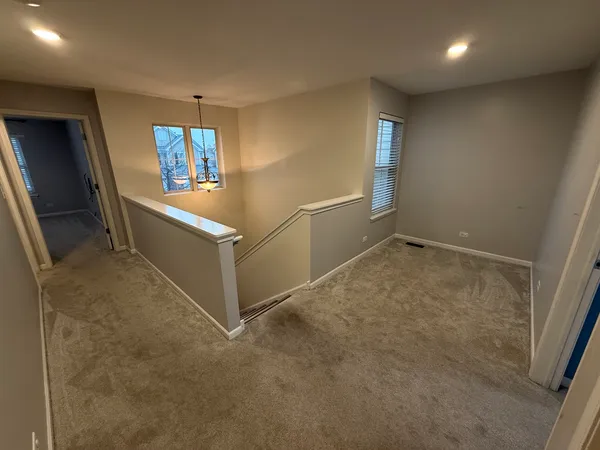 a view of an entryway with a window