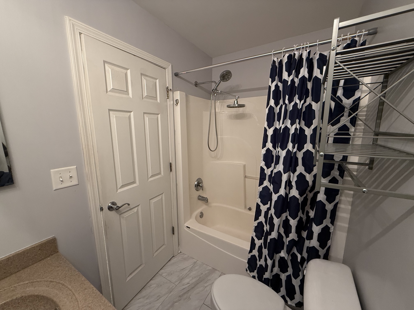 433 Acushnet Street, Unit 433 Elgin, IL 60124 - Photo 26 of 37 a bathroom with a shower curtain