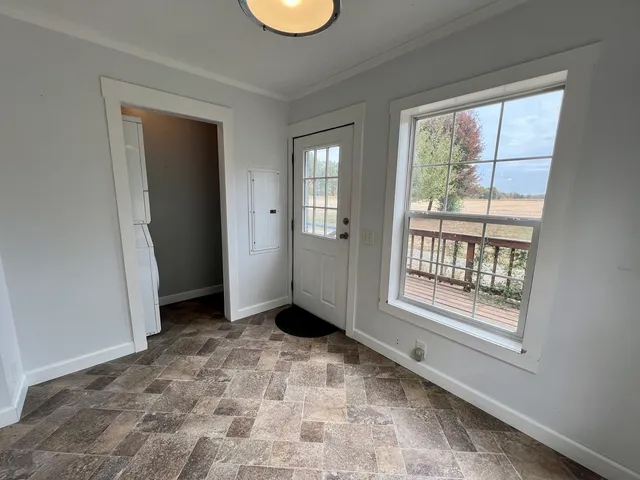 an empty room with windows