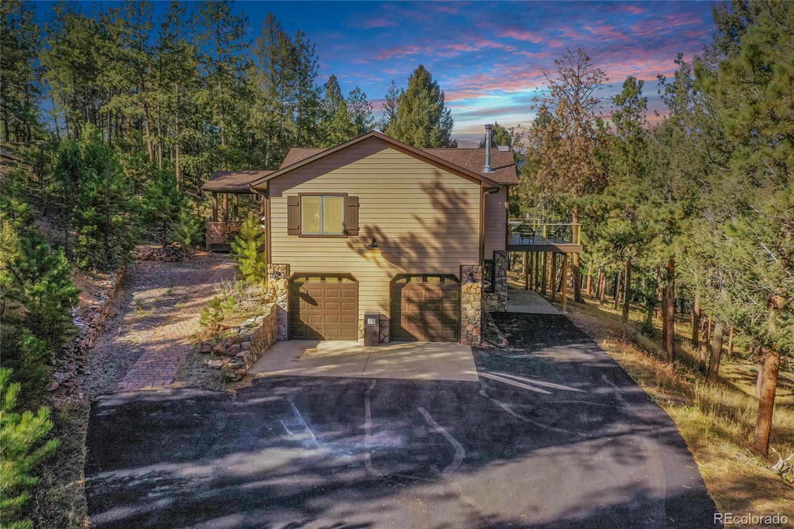 502 County Road 1034 Bailey, CO 80421 - Photo 3 of 20 a view of a house with a yard
