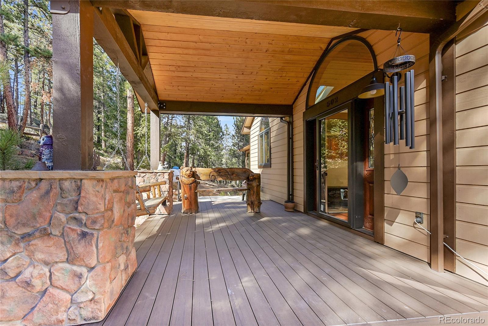 502 County Road 1034 Bailey, CO 80421 - Photo 5 of 20 a view of steet with deck and outdoor seating