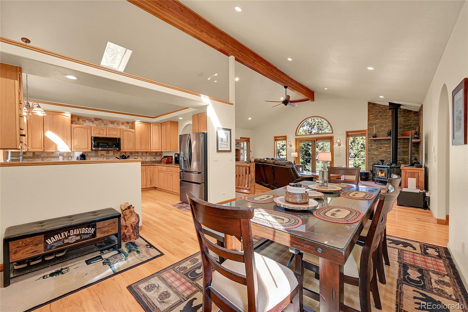 502 County Road 1034 Bailey, CO 80421 - Photo 6 of 20 a view of a dining room with furniture and a kitchen
