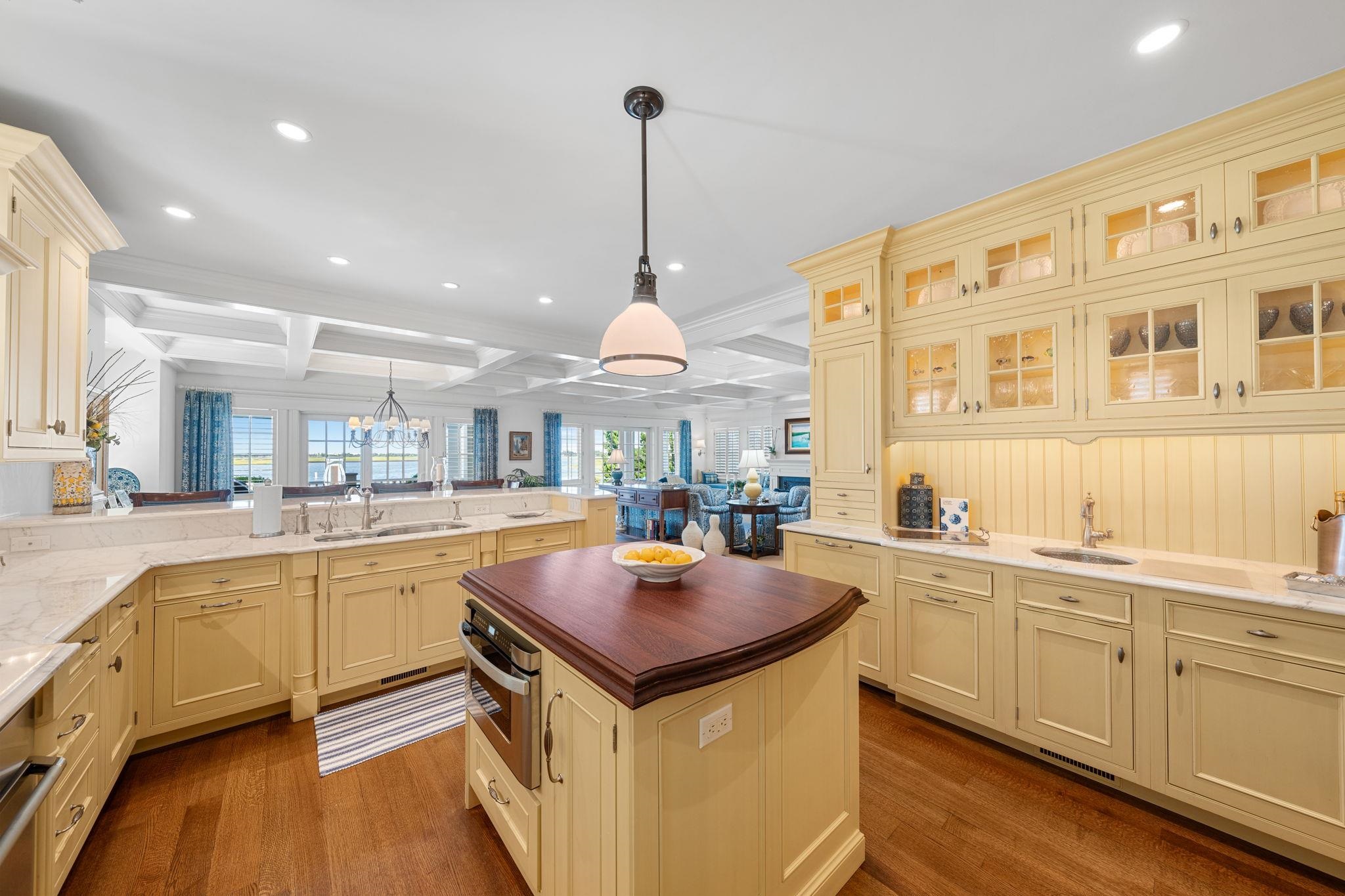 501 42nd Street Avalon, NJ 08202 - Photo 11 of 50 a kitchen with a sink stove and cabinets