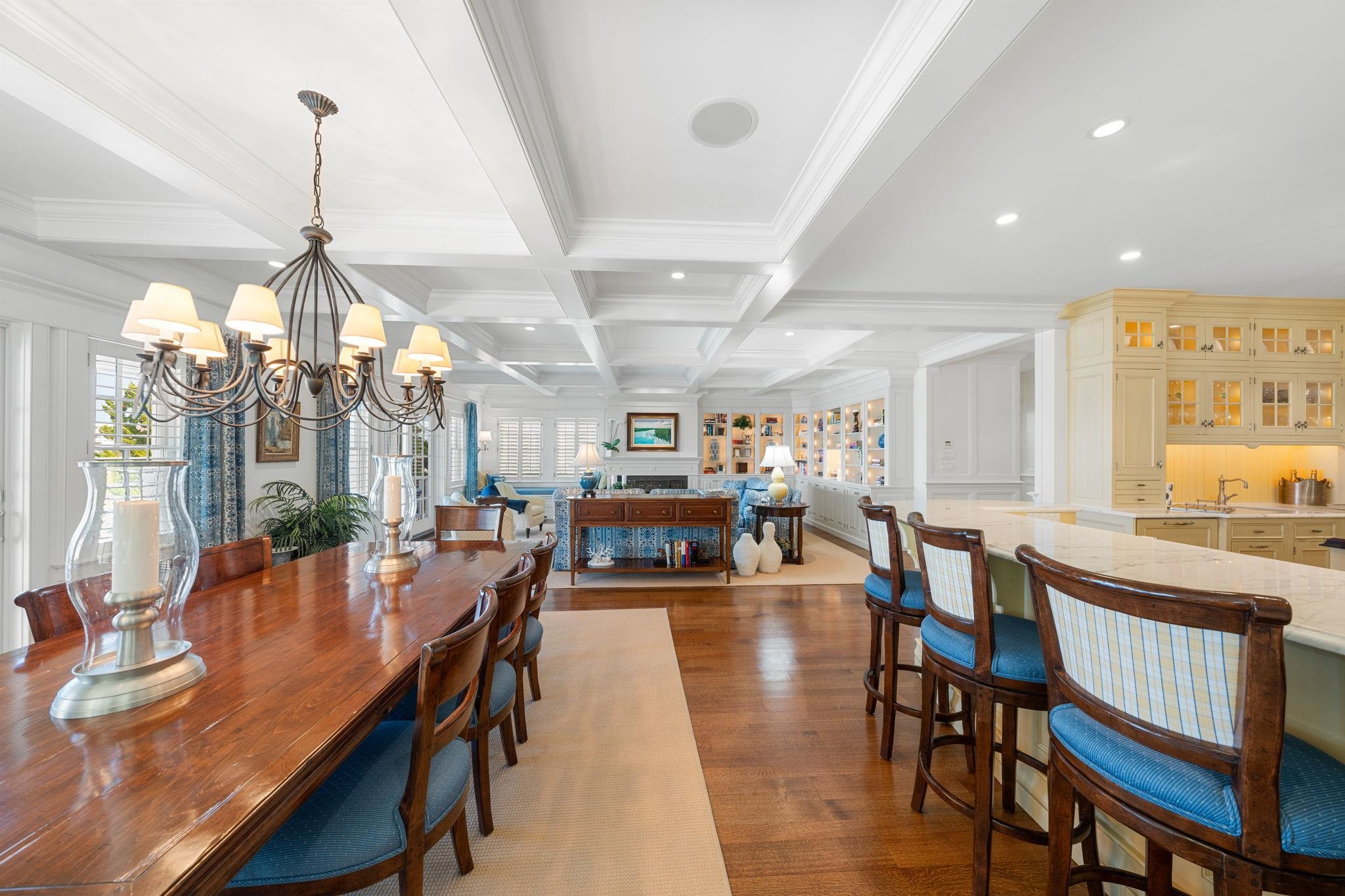 501 42nd Street Avalon, NJ 08202 - Photo 13 of 50 a dining room with furniture a chandelier and wooden floor
