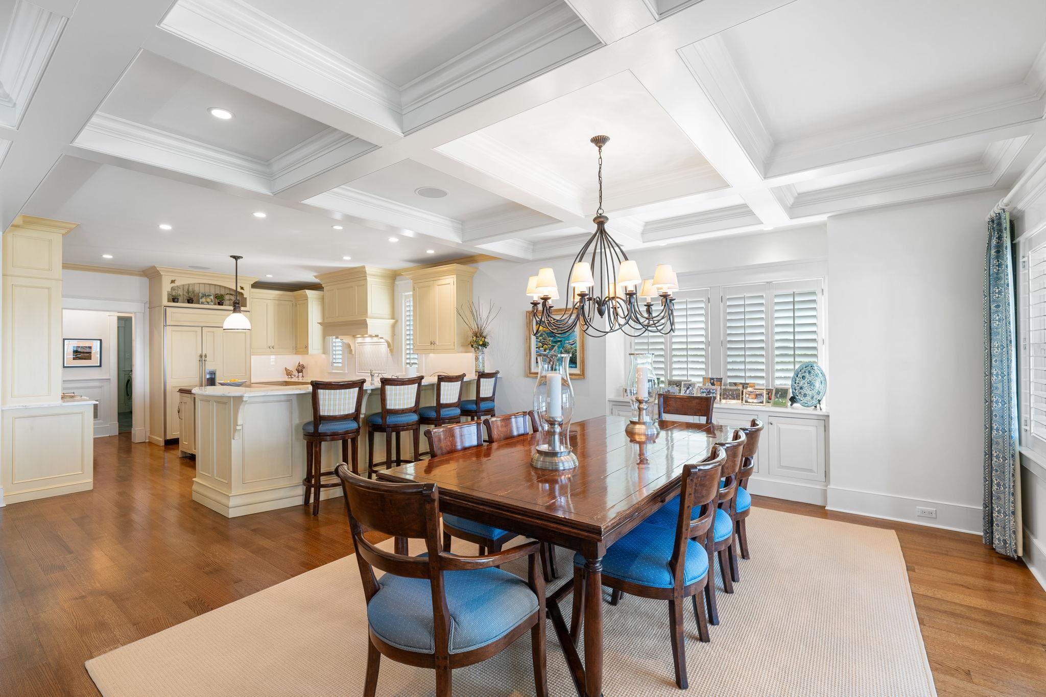 501 42nd Street Avalon, NJ 08202 - Photo 14 of 50 a view of a dining room and livingroom with furniture wooden floor a chandelier