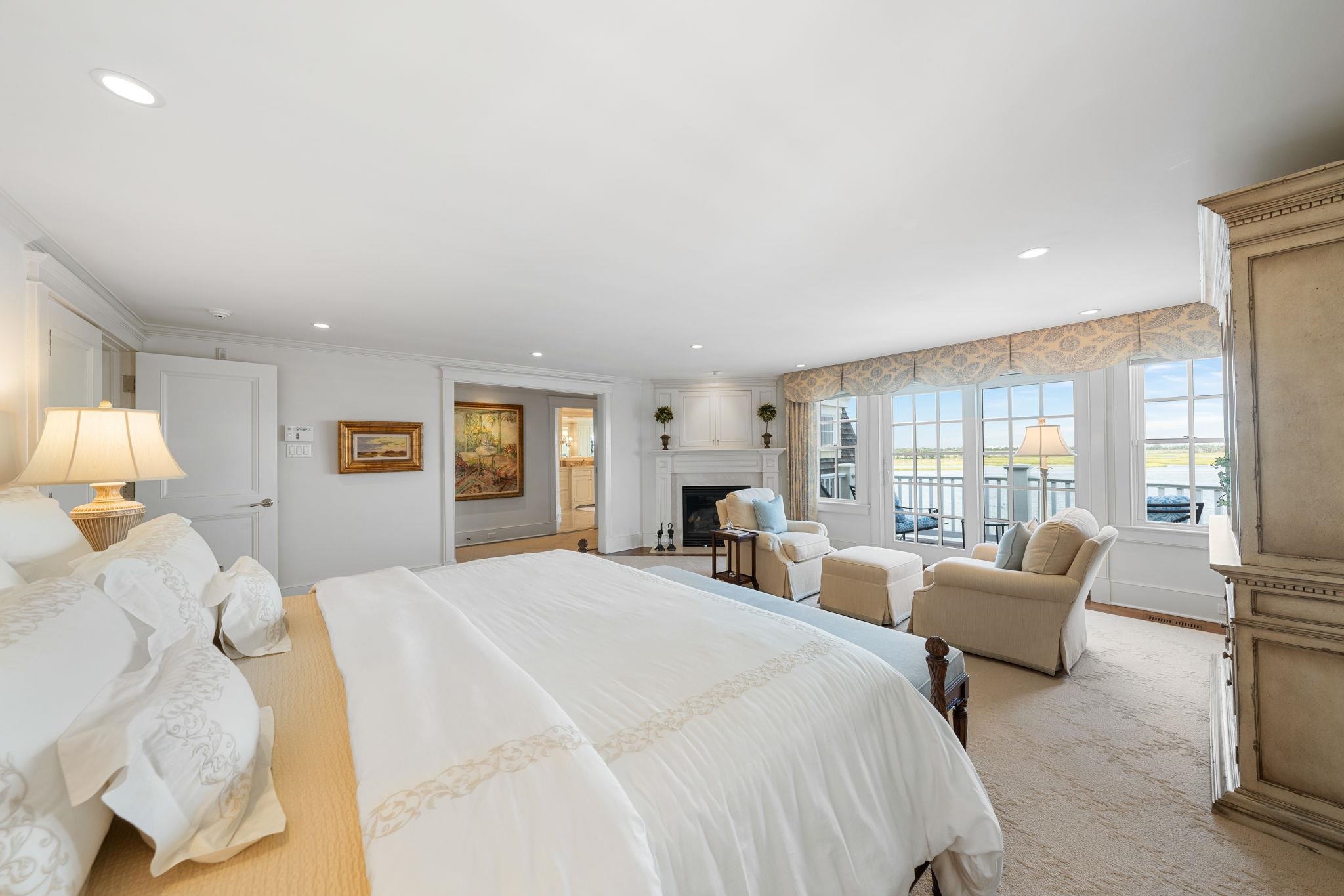 501 42nd Street Avalon, NJ 08202 - Photo 37 of 50 a bedroom with a bed and a large window