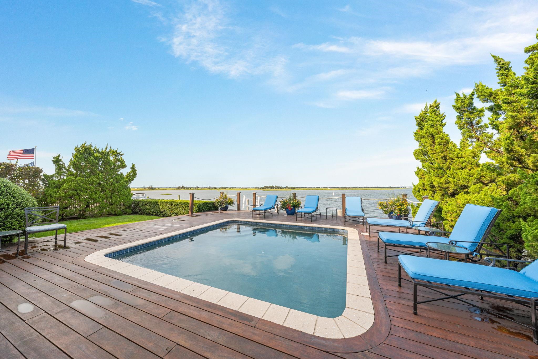 501 42nd Street Avalon, NJ 08202 - Photo 49 of 50 a view of a swimming pool with lounge chair