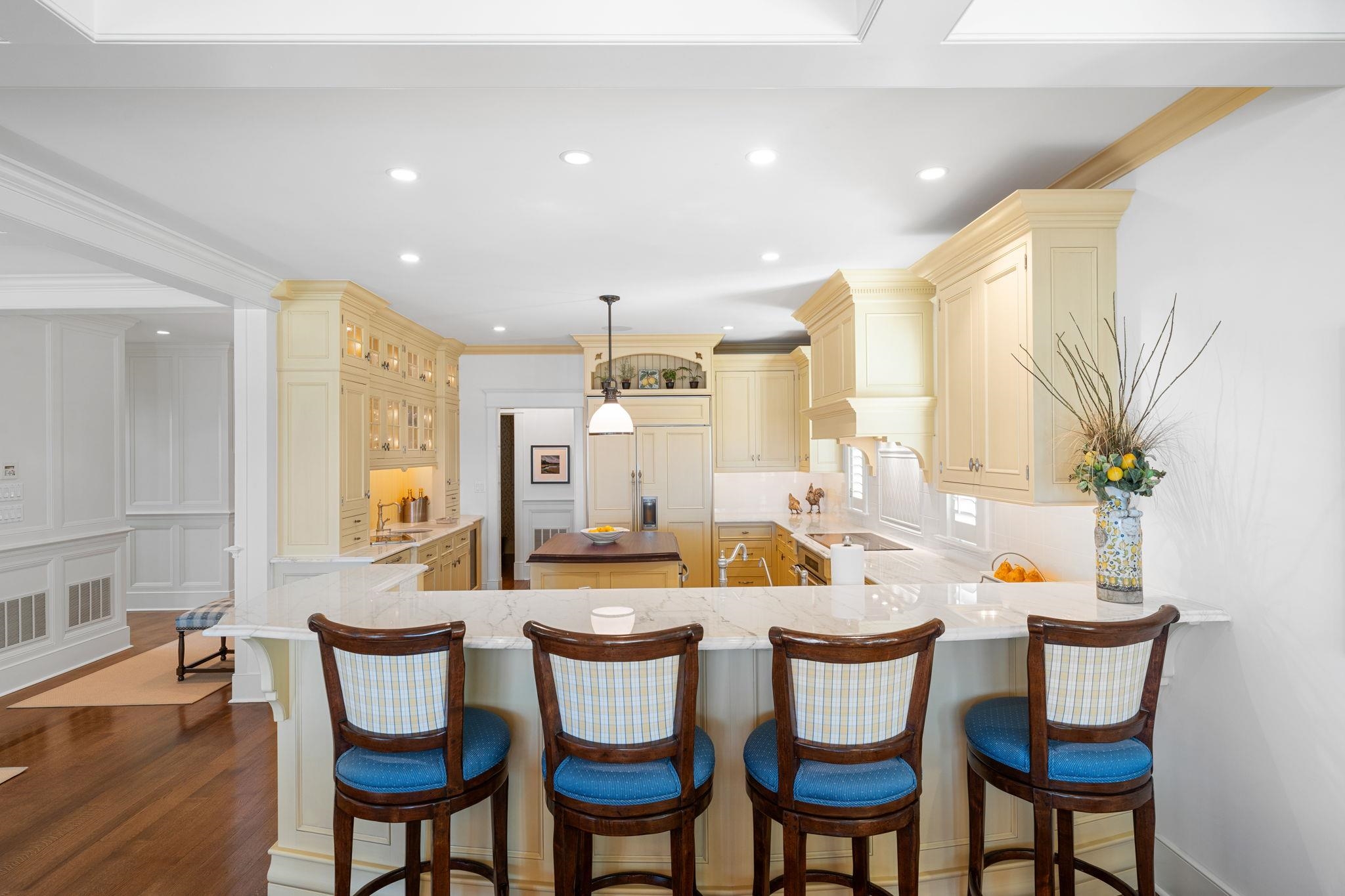 501 42nd Street Avalon, NJ 08202 - Photo 7 of 50 a dining room with stainless steel appliances a table and chairs