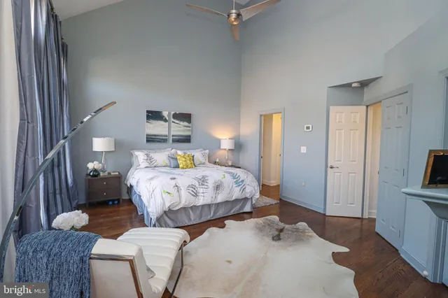a bedroom with a bed and a view of bathroom