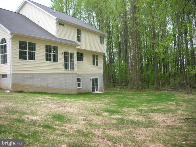 12400 Timber Grove Road Owings Mills, MD 21117 - Photo 2 of 12 Back yard