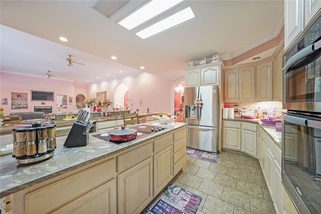 1827 Poplar Springs Road Hiram, GA 30141 - Photo 14 of 45 a kitchen with a sink stainless steel appliances and cabinets