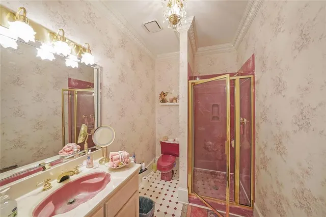 a bed room with furniture and a chandelier