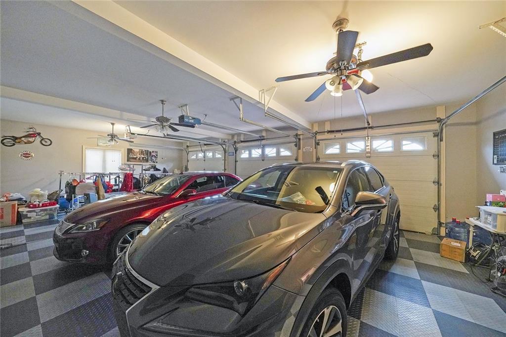 1827 Poplar Springs Road Hiram, GA 30141 - Photo 17 of 45 a bed room with furniture and a chandelier