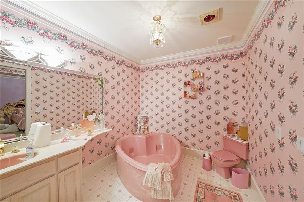 1827 Poplar Springs Road Hiram, GA 30141 - Photo 21 of 45 a bathroom with a sink toilet and shower