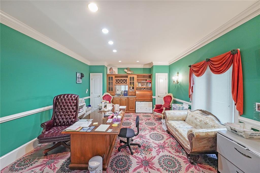 1827 Poplar Springs Road Hiram, GA 30141 - Photo 22 of 45 a living room with furniture and a wooden floor