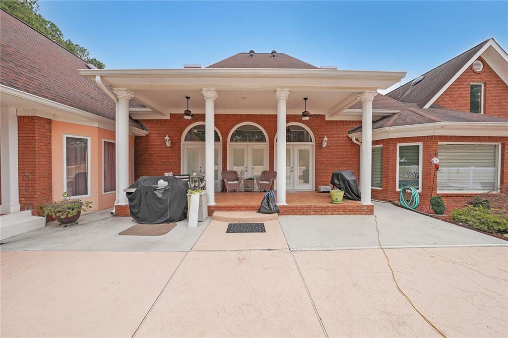 1827 Poplar Springs Road Hiram, GA 30141 - Photo 41 of 45 a view of a building with a outdoor space