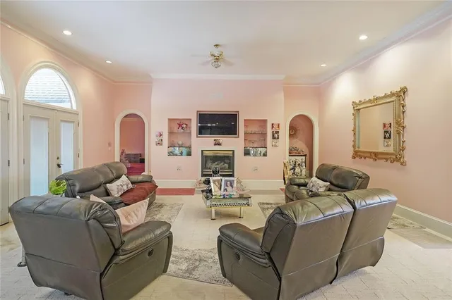 a kitchen with a sink appliances and cabinets