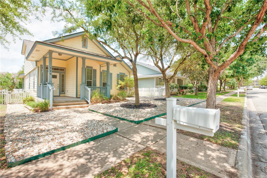 729 Scheel Road Kyle, TX 78640 - Photo 1 of 1 a front view of a house with a yard