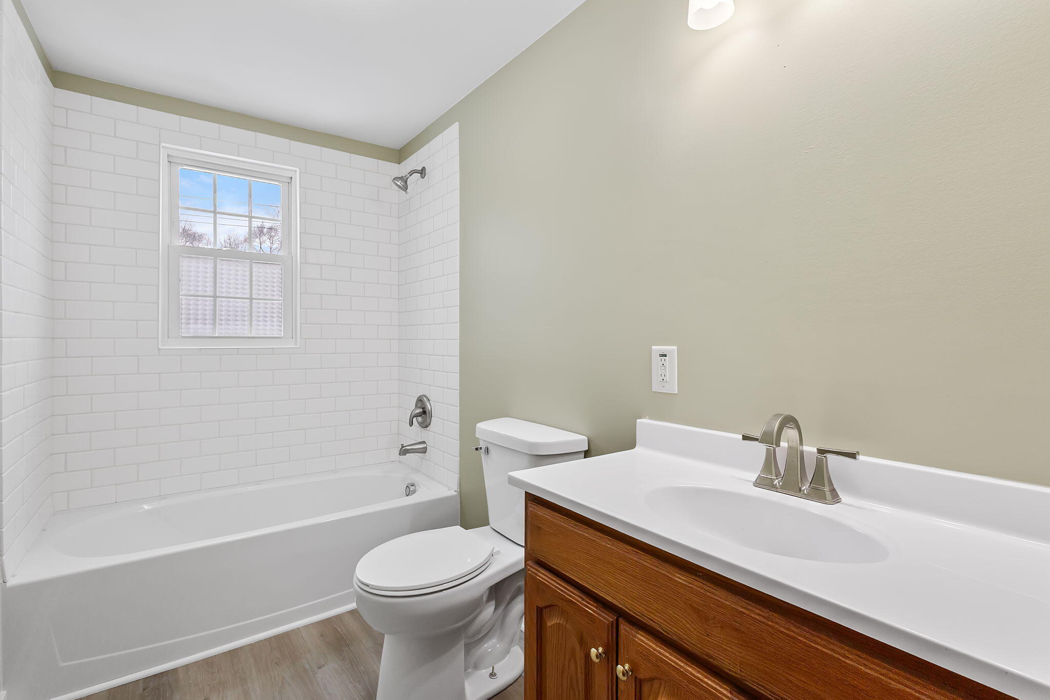 314 Cline Avenue Griffith, IN 46319 - Photo 13 of 36 a bathroom with a sink a toilet and shower