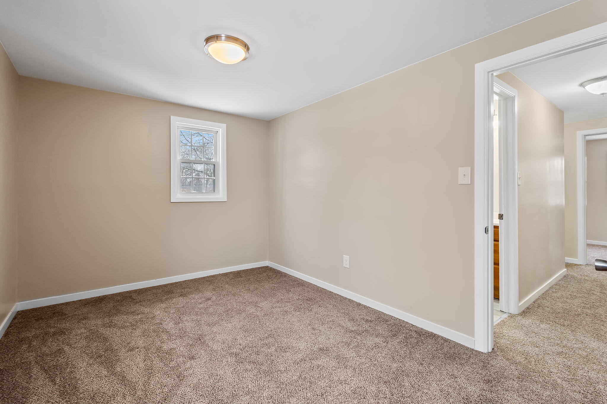 314 Cline Avenue Griffith, IN 46319 - Photo 19 of 36 wooden floor in an empty room and a window