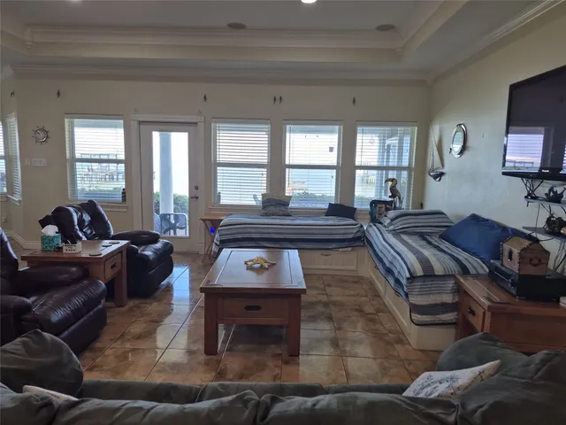 a living room with furniture and a window