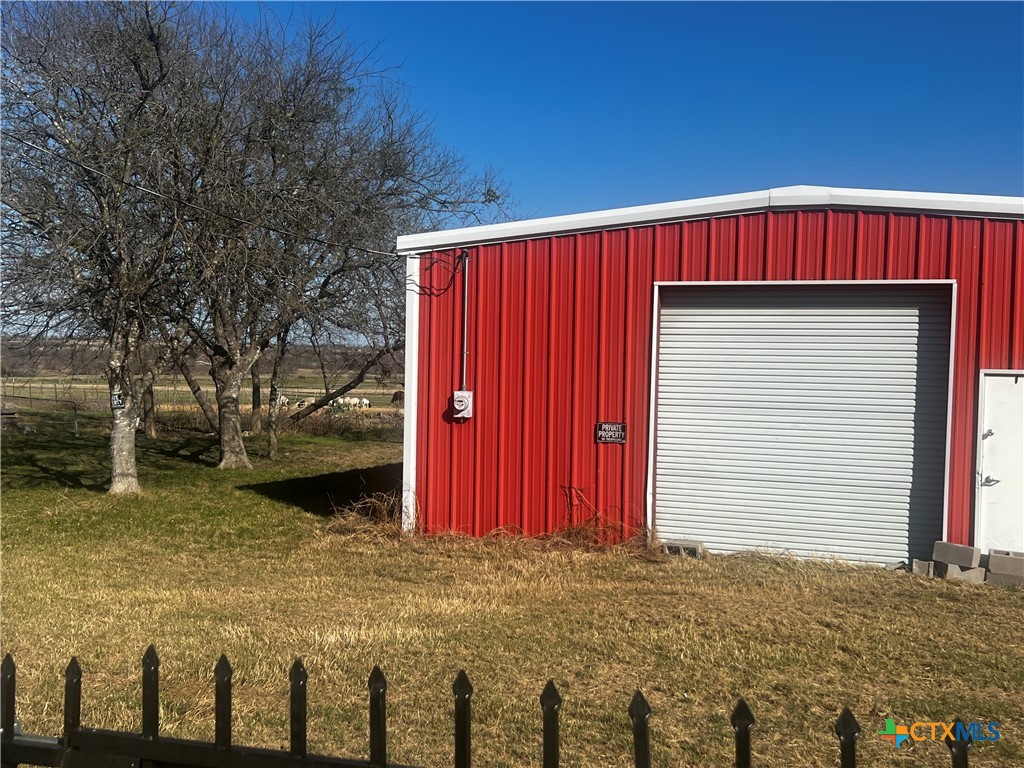 605 East Rogers Cemetery Road Rogers, TX 76569 - Photo 3 of 5 a view of a house with a yard