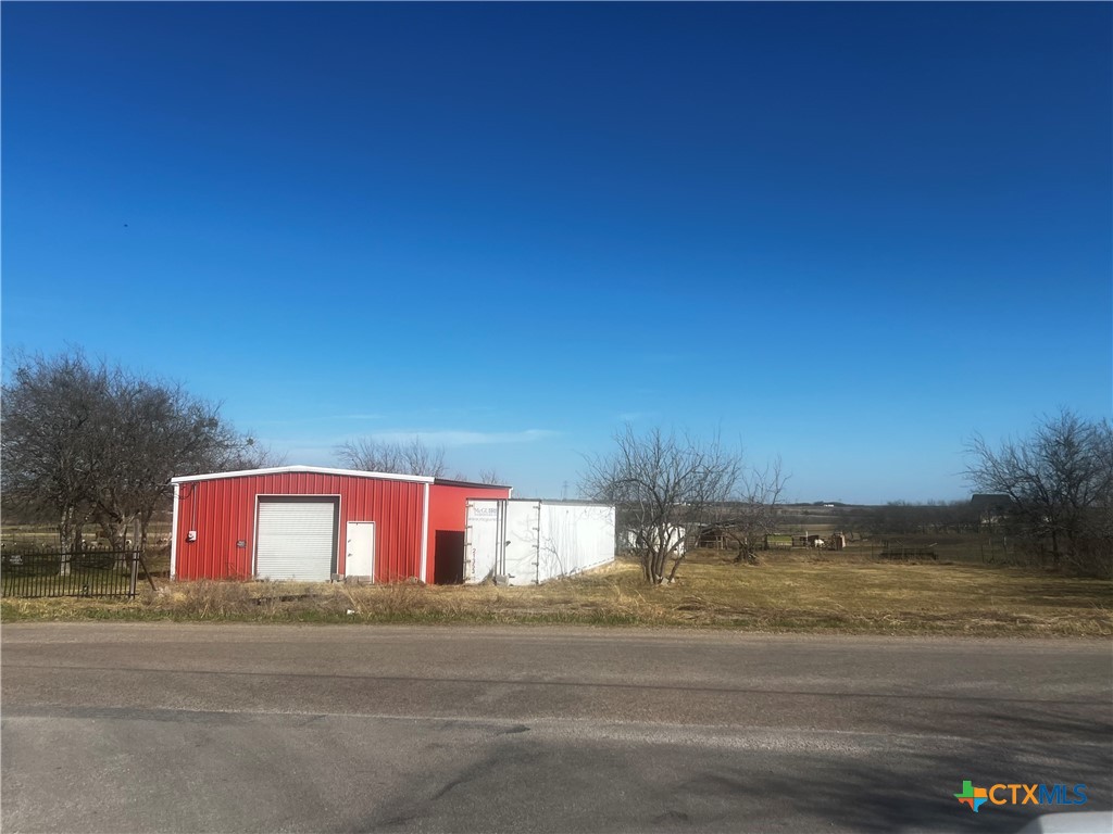 605 East Rogers Cemetery Road Rogers, TX 76569 - Photo 5 of 5 a view of a building with a street
