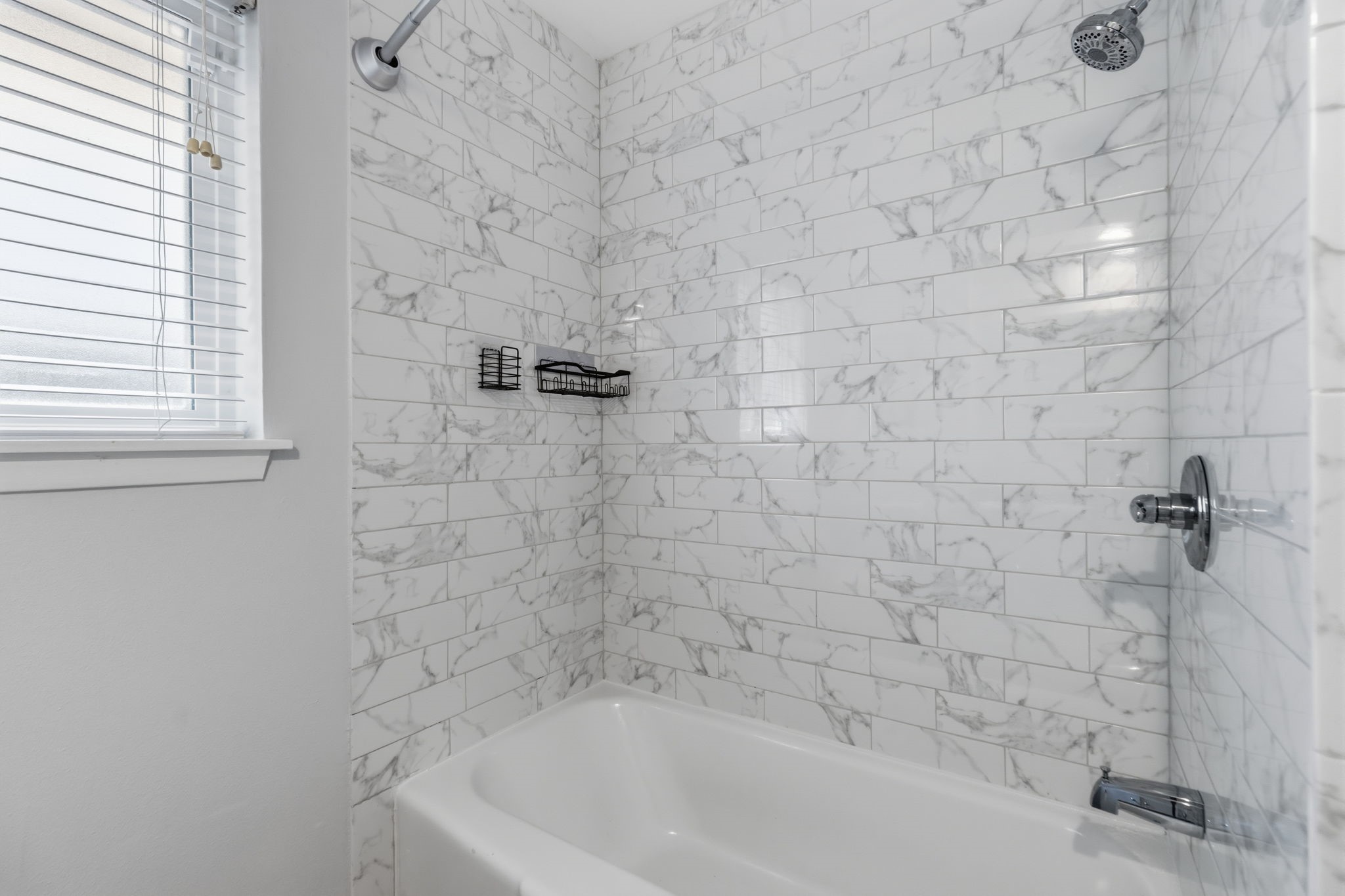 5410 Indigo Street Houston, TX 77096 - Photo 23 of 30 Nice second full bathroom with combo tub and shower.
