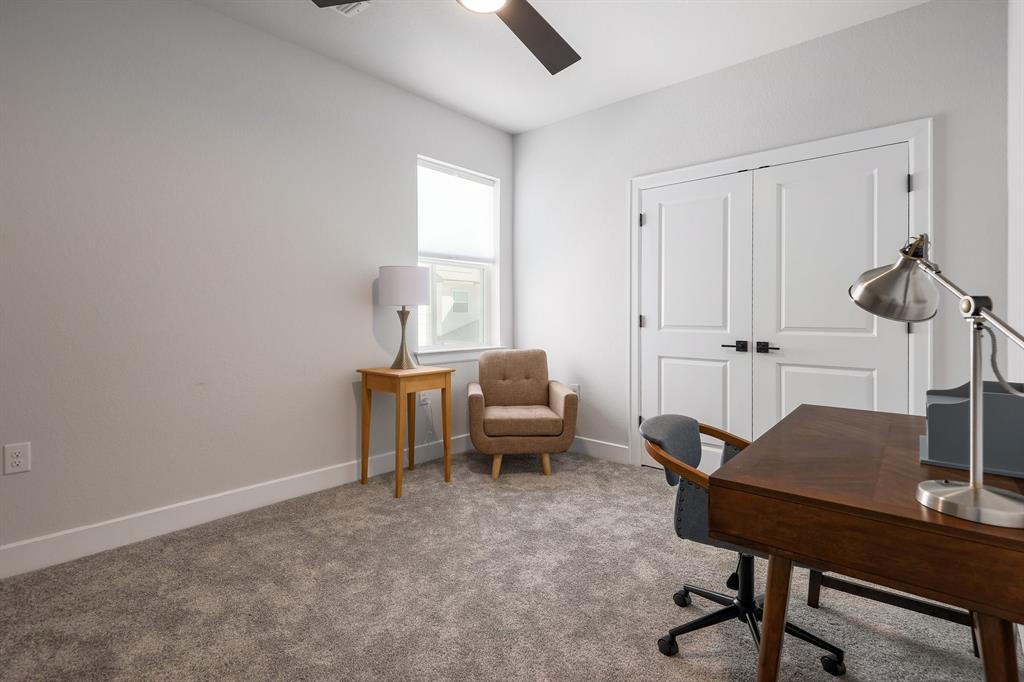 3907 Tilley Street Austin, TX 78723 - Photo 22 of 26 a workspace with furniture and a window