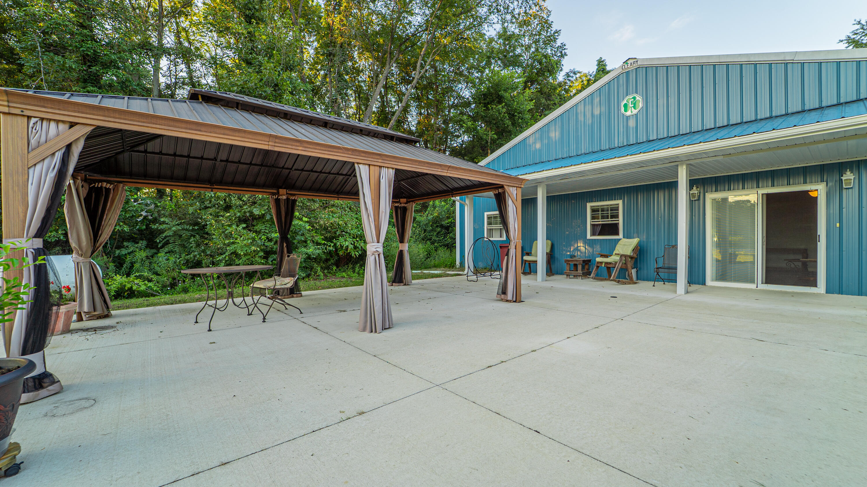 8790 Highway 35 Monterey, IN 46960 - Photo 12 of 22 a backyard of a house with yard and outdoor seating