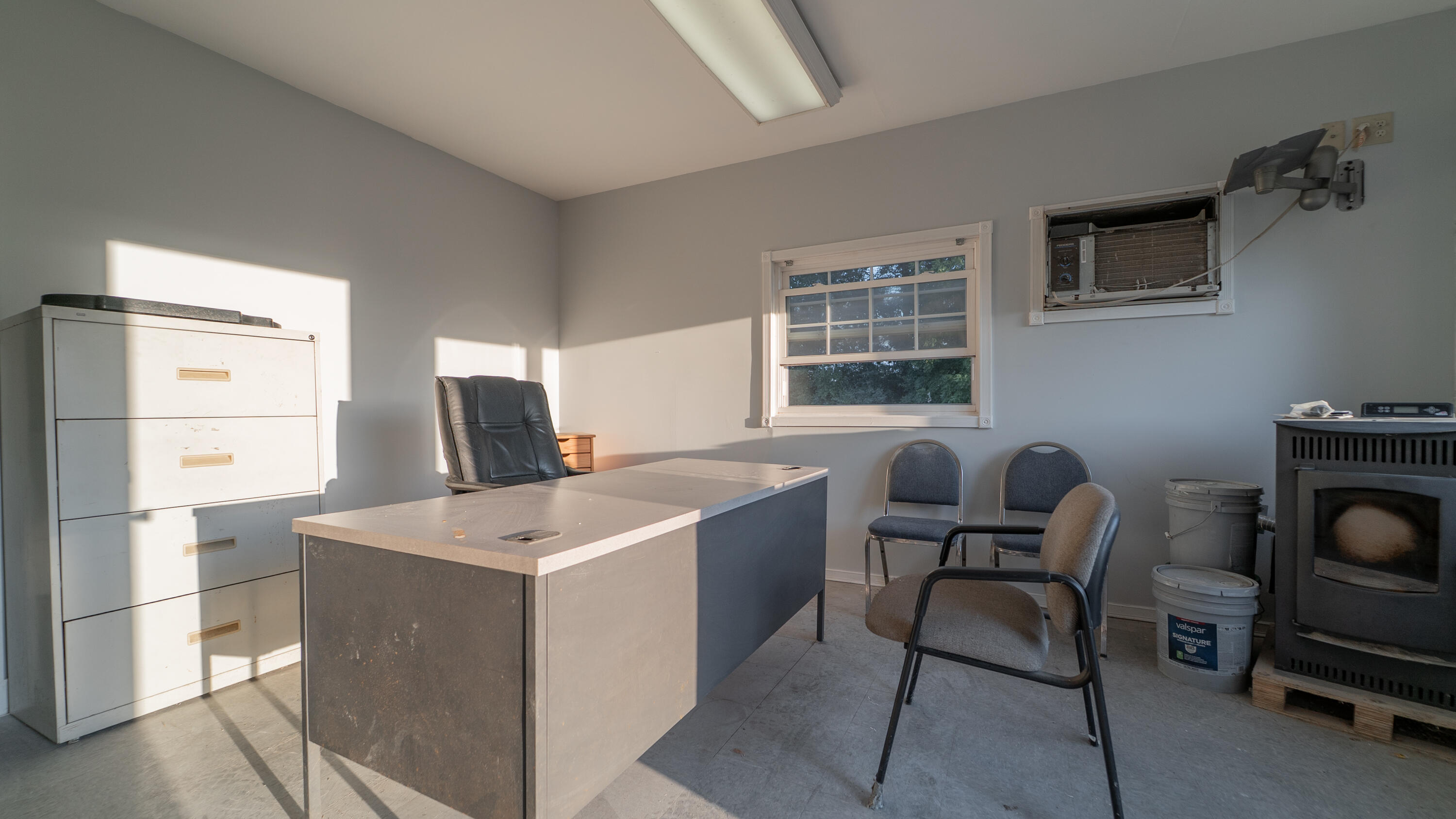 8790 Highway 35 Monterey, IN 46960 - Photo 16 of 22 a room that has a couch and a stove in it