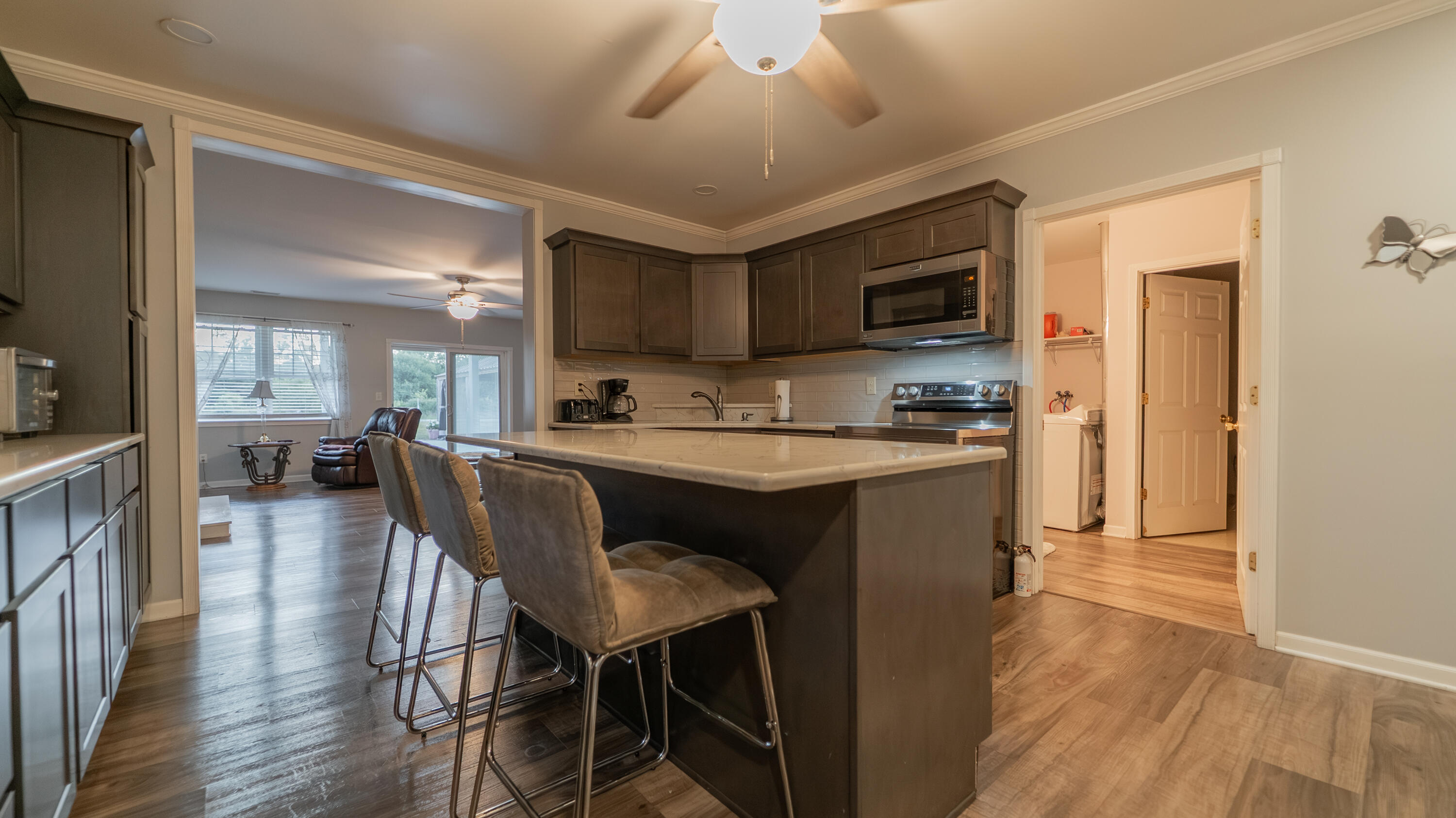 8790 Highway 35 Monterey, IN 46960 - Photo 4 of 22 a kitchen with a table chairs refrigerator and cabinets