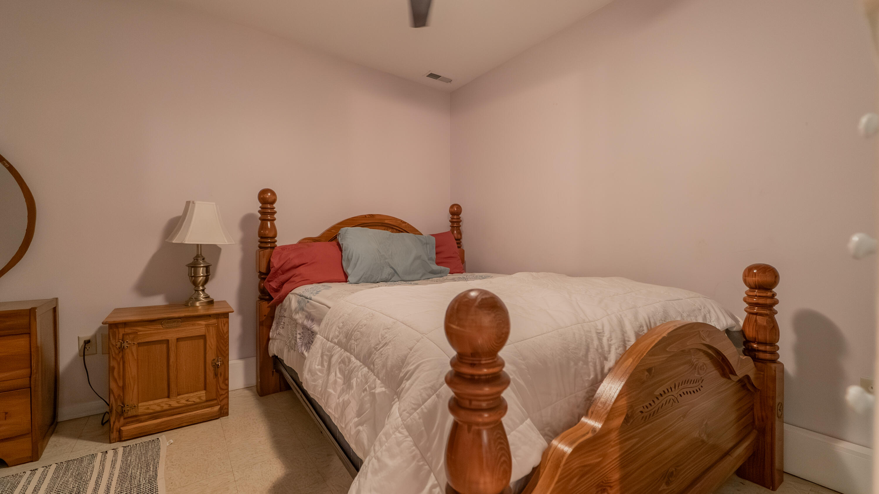 8790 Highway 35 Monterey, IN 46960 - Photo 6 of 22 a bedroom with a bed and a potted plant on the dresser