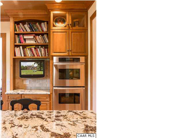 2000 Red Hill Road Charlottesville, VA 22903 - Photo 14 of 43 Features include below counter lighting, glass enclosed display cabinetry and tile back splash under cabinetry