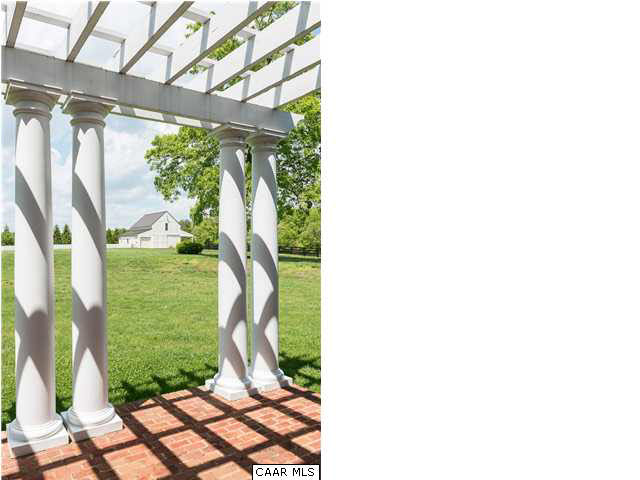 2000 Red Hill Road Charlottesville, VA 22903 - Photo 30 of 43 Double columned Pergola off family room is simply stunning. Brick patio is ideal for entertaining in the afternoon. The fenced in organic garden just beyond and beside the 2-level stable.